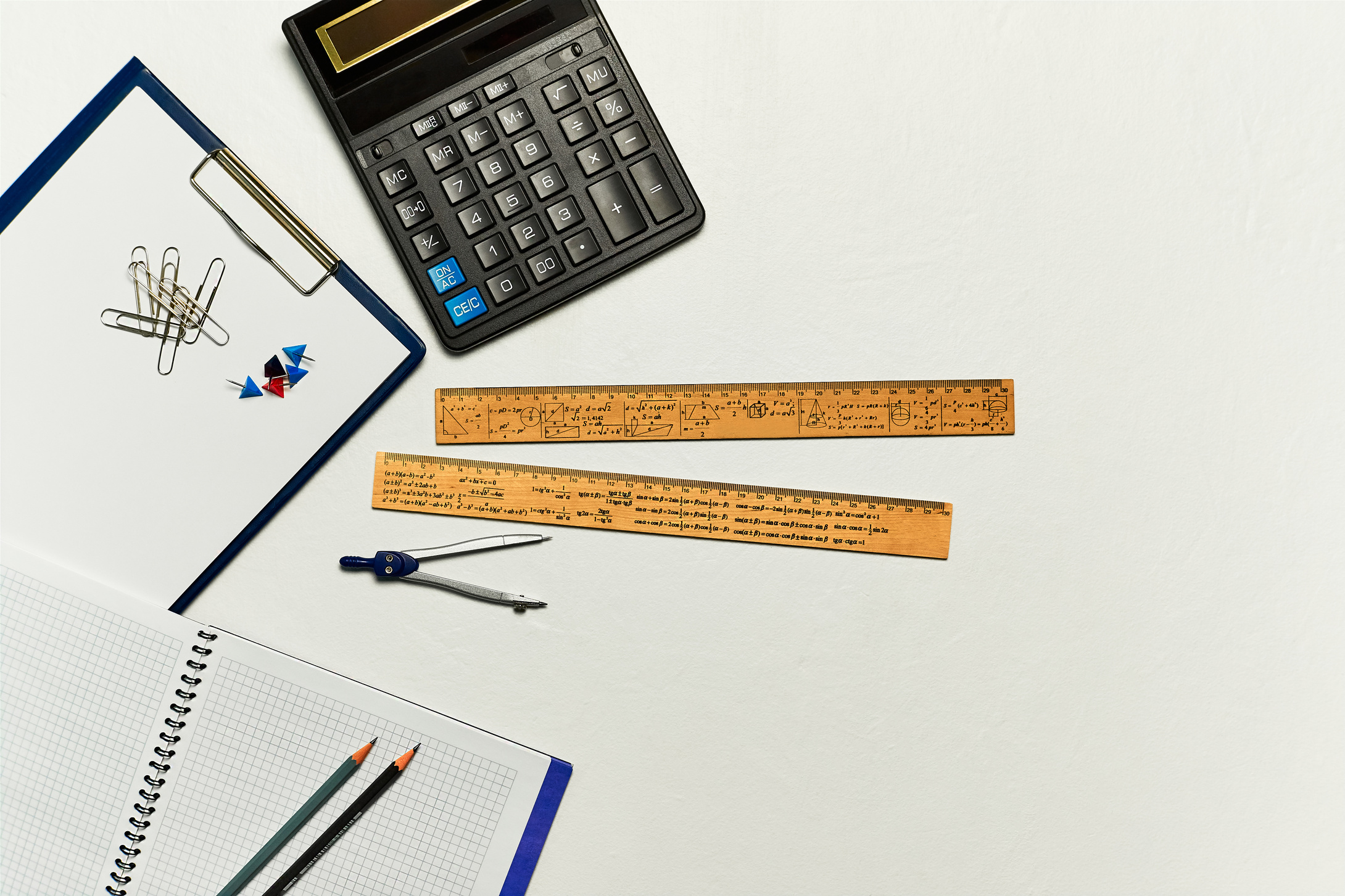 Math concept. School supplies used in math, geometry or science.